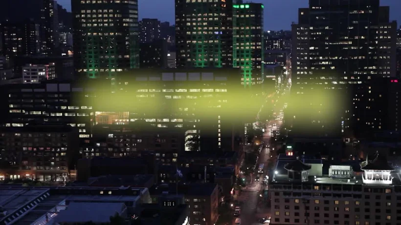 City footage and lighting effect video frame.